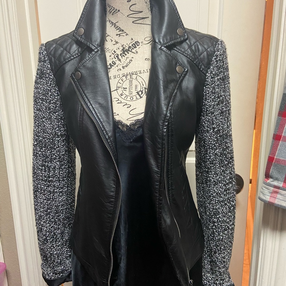 Short, stylish, zip up jacket.